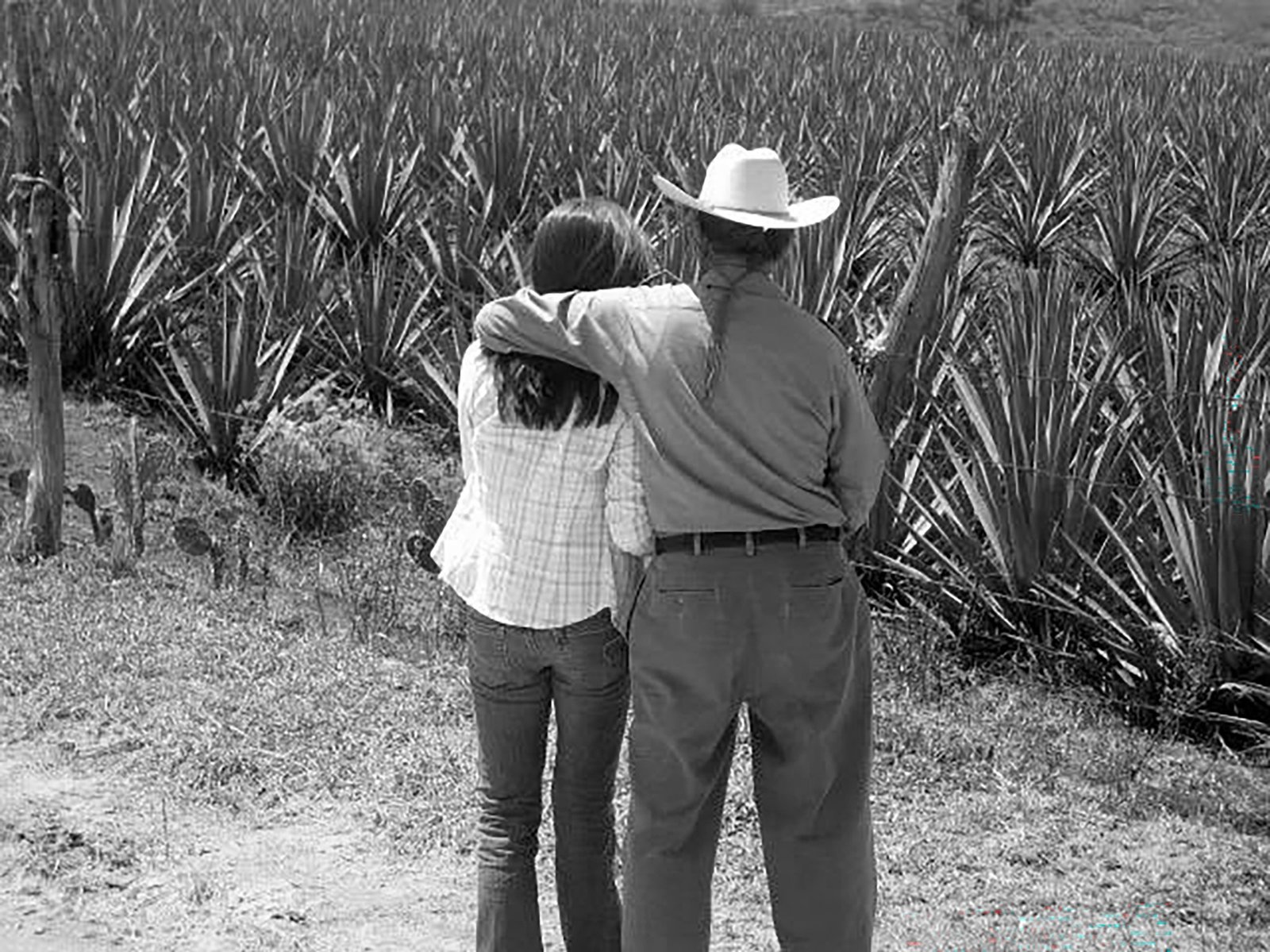 Family members walking together through the agave fields in Zacatecas