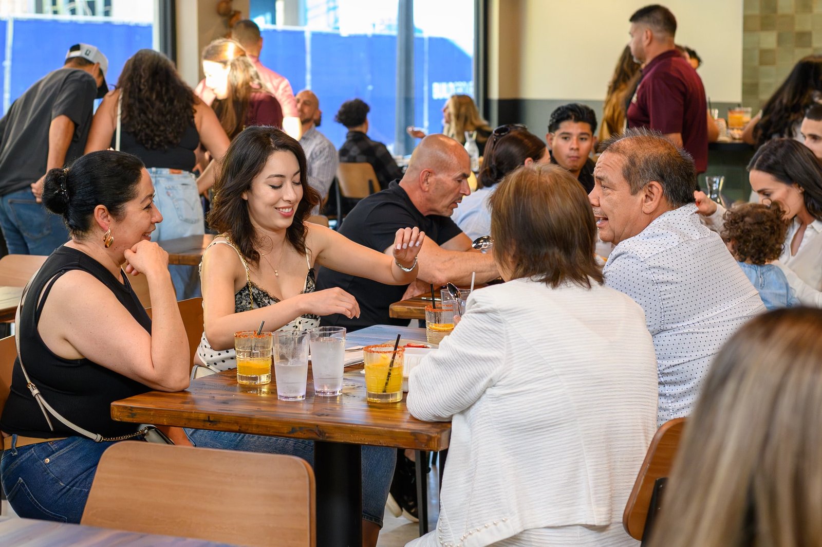 Family and friends sharing a table at Don Perico